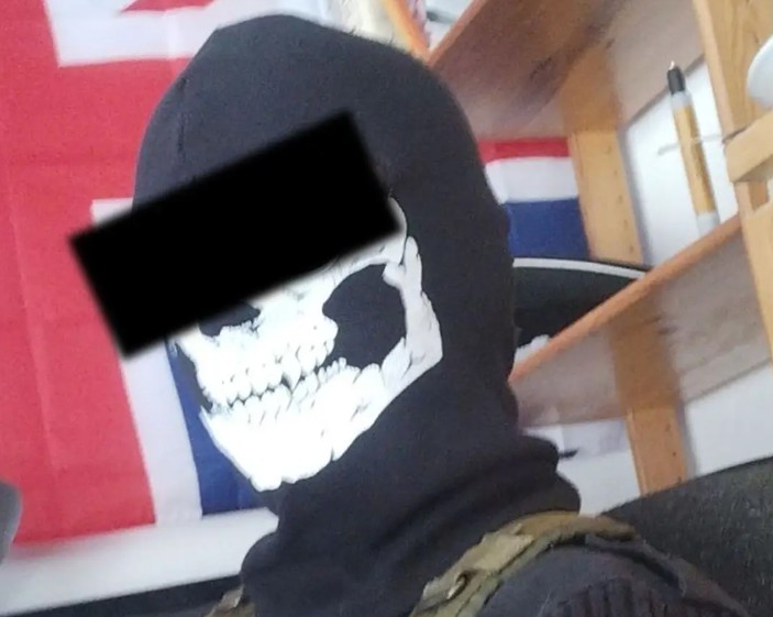 Who the hell are you? Take off that shitty mask.