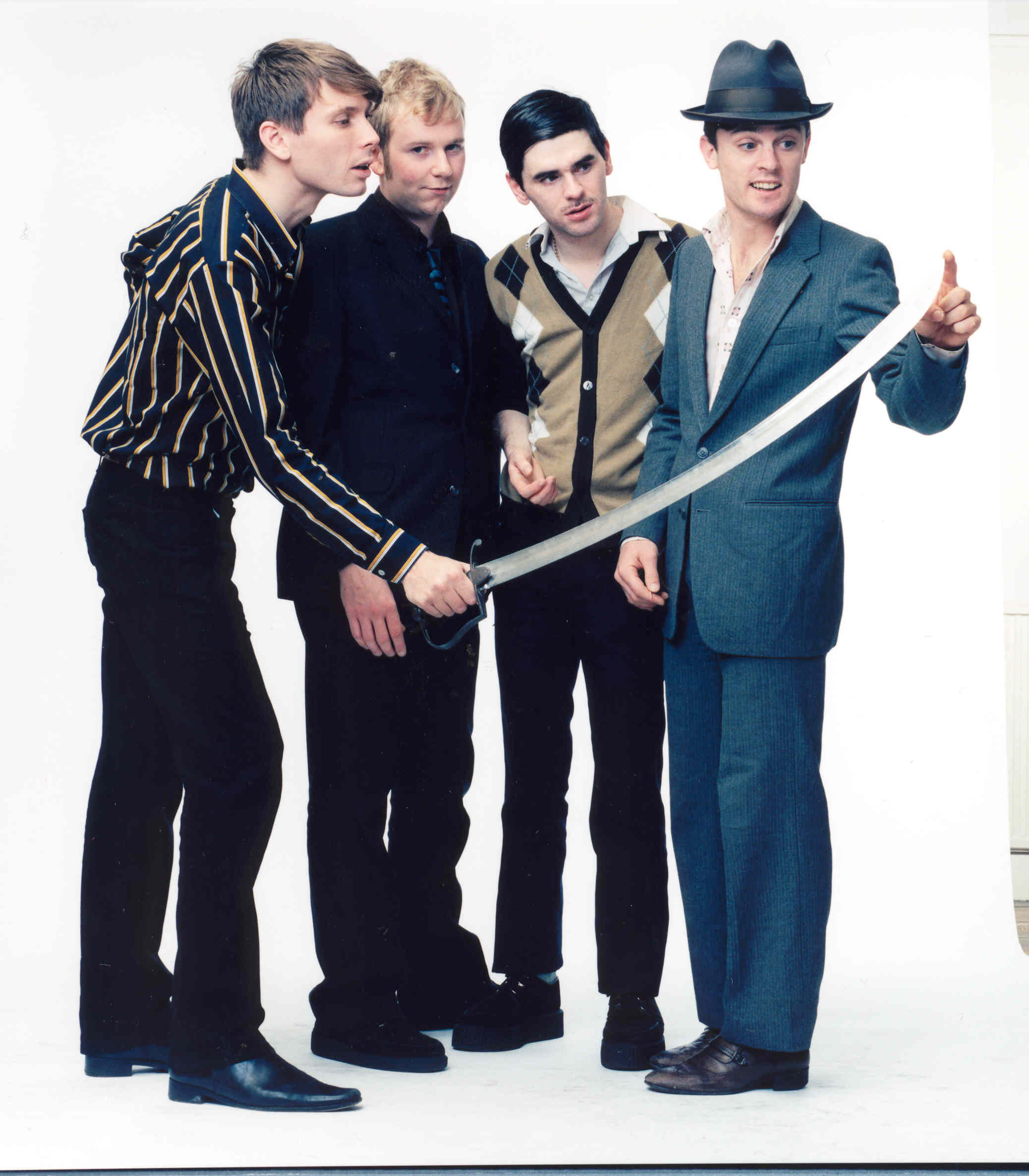 Franz Ferdinand being homo-erotic with a sword, "OMG ith like, soooo sharp!"