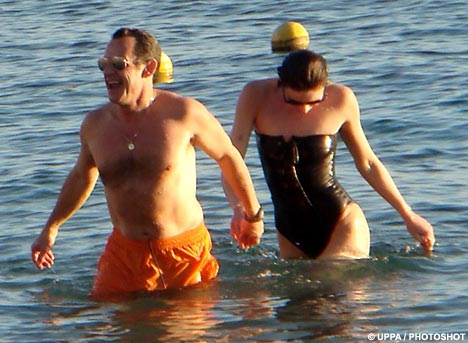 French President Nick Sarkozy and [[whore|new friend